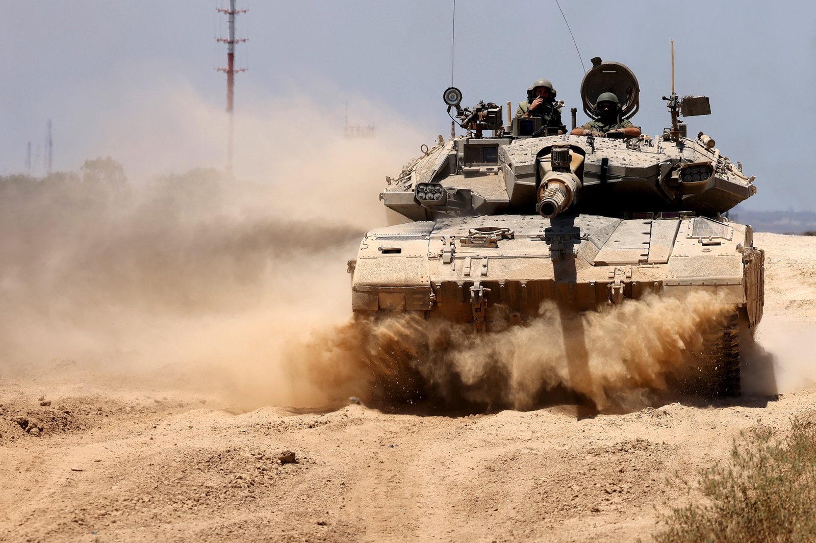 An Israeli army tank rolls to take position in an area along Israel's southern border with the Palestinian Gaza Strip on June 18, 2024, amid the ongoing conflict between Israel and the Palestinian militant group Hamas.,Image: 882688558, License: Rights-managed, Restrictions: , Model Release: no, Credit line: JACK GUEZ / AFP / Profimedia