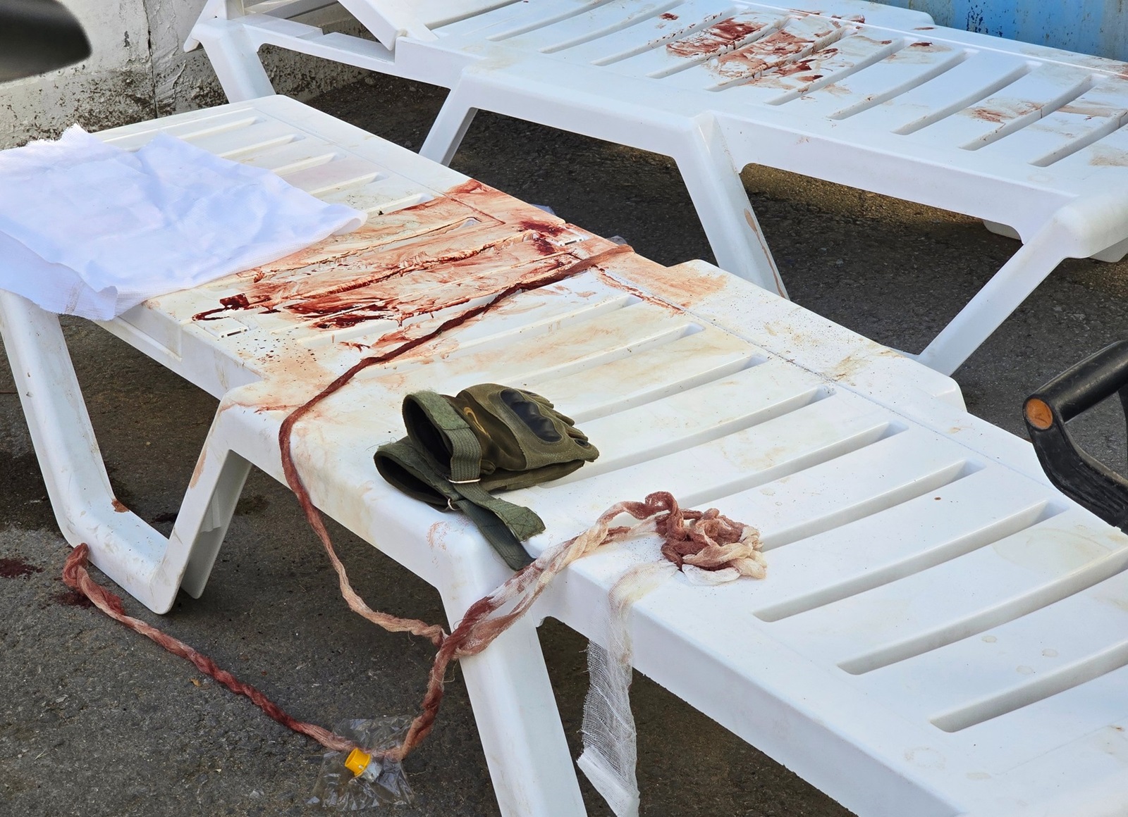 8714972 23.06.2024 A view shows bloodied sun loungers following a Ukrainian missile attack amid Russia's military operation in Ukraine, in Sevastopol, Republic of Crimea, Russia. Ukrainian forces reportedly fired five US-made MGM-140 ATACMS missiles with cluster warheads, four of which were shot down and one deflected and exploded over the city, injuring at least 124 people, including 27 children. The death toll from the Ukrainian missile attack on the city has risen to 5 people, including 3 children, Sevastopol Governor Mikhail Razvozhayev said.,Image: 884079870, License: Rights-managed, Restrictions: Editors' note: THIS IMAGE IS PROVIDED BY RUSSIAN STATE-OWNED AGENCY SPUTNIK., Model Release: no, Credit line: Konstantin Mihalchevskiy / Sputnik / Profimedia