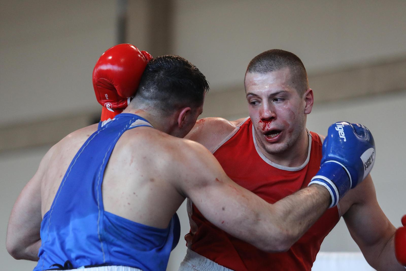 28.01.2024., Sesvete - U OS Jelkovec u Sesvetama odrzano je Finale Prvenstva Hrvatske u boksu. Luka Prtljacic, Marko Milun. Photo: Tomislav Miletic/PIXSELL