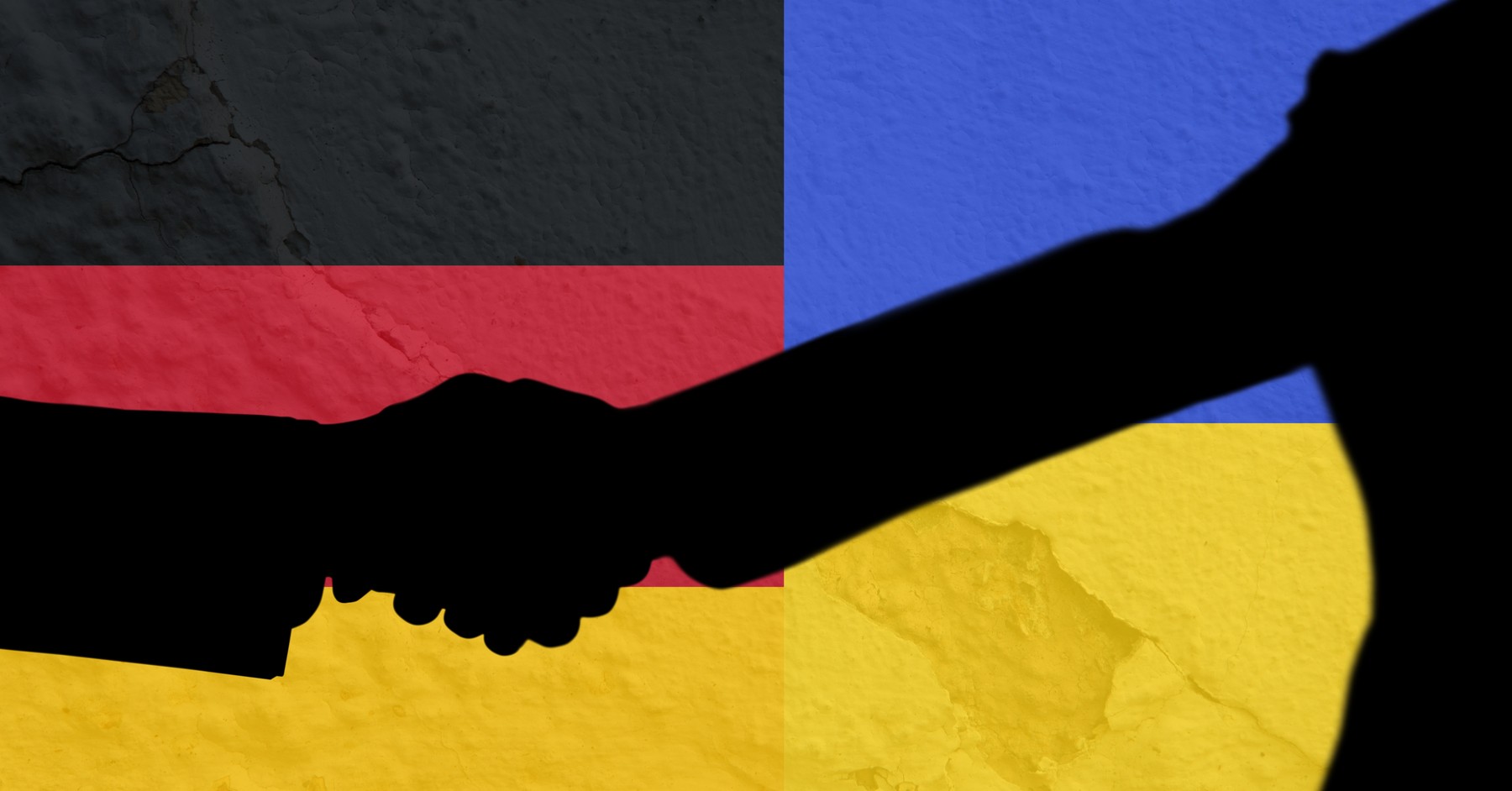 Silhouette of two men shaking hands against ukraine and germany flag background. international relations concept,Image: 675789701, License: Royalty-free, Restrictions: , Model Release: no, Credit line: - / Wavebreak / Profimedia