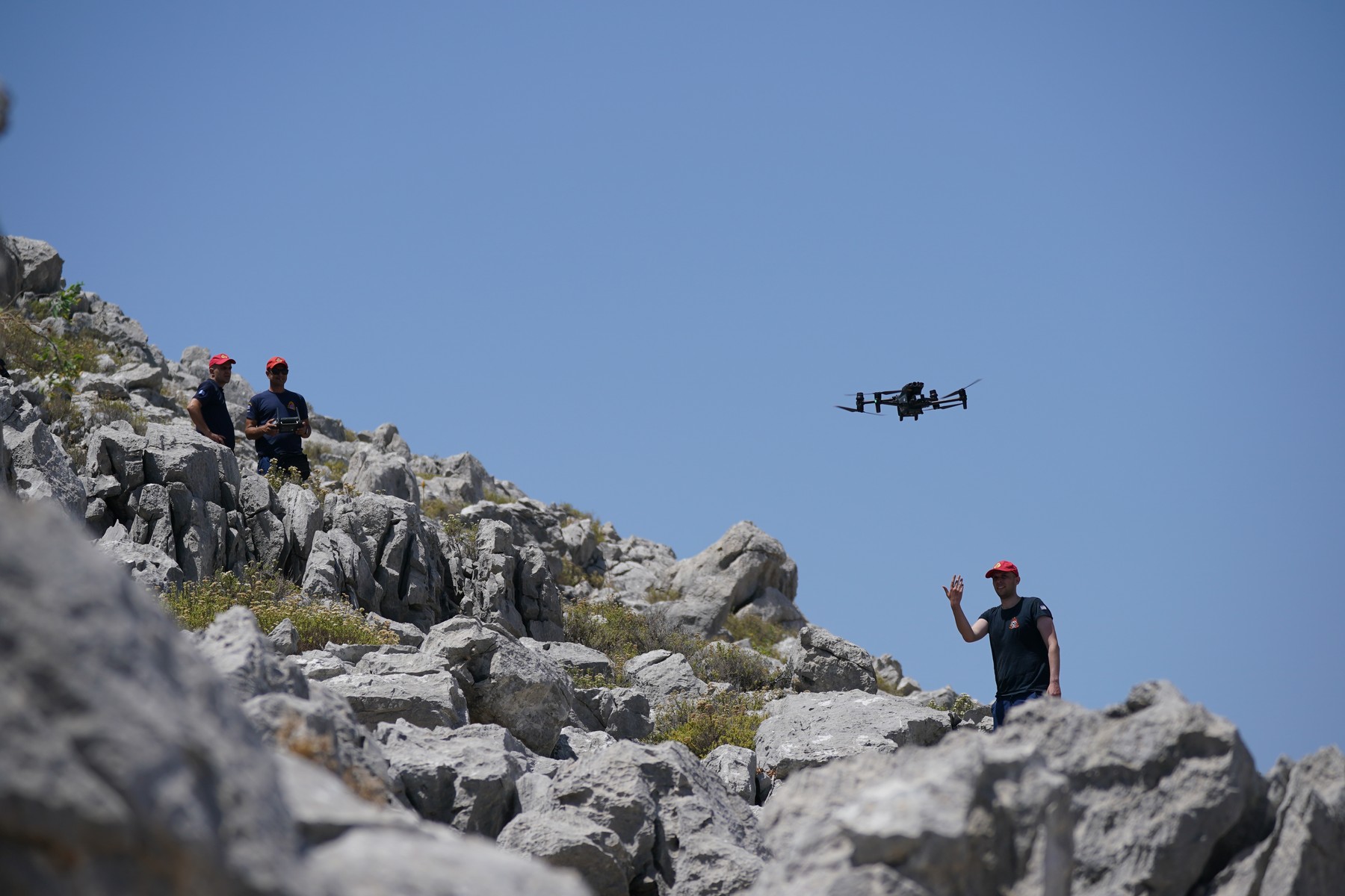 A member of the search team flying a drone in Symi, Greece, where a search and rescue operation is under way for TV doctor and columnist Michael Mosley, after he went missing while on holiday. Police and firefighters have been using drones to scour the island, which is part of the Dodecanese island chain and is about 25 miles north of Rhodes. Picture date: Saturday June 8, 2024.,Image: 879905234, License: Rights-managed, Restrictions: , Model Release: no, Credit line: Yui Mok / PA Images / Profimedia