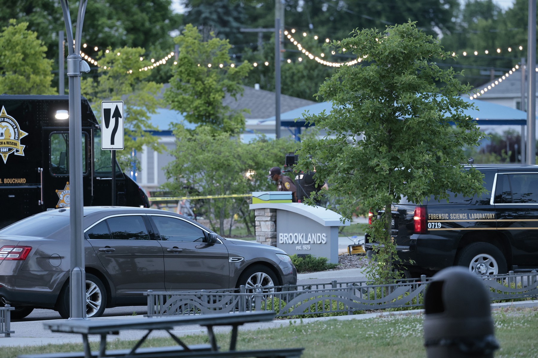 Oakland County Sheriff Evidence Technicians document the scene where a shooting took place at Brooklands Plaza Splash Pad in Rochester Hills, Michigan, on June 15, 2024.  A shooter opened fire at a water park in the US state of Michigan on June 15, wounding nine or more people including at least one child, police said. The victims were of varying ages, including one eight-year-old. The local sheriff's office said it potentially had the suspect contained near the scene of the shooting in Rochester Hills, a suburb of Detroit.,Image: 881977844, License: Rights-managed, Restrictions: , Model Release: no, Credit line: JEFF KOWALSKY / AFP / Profimedia