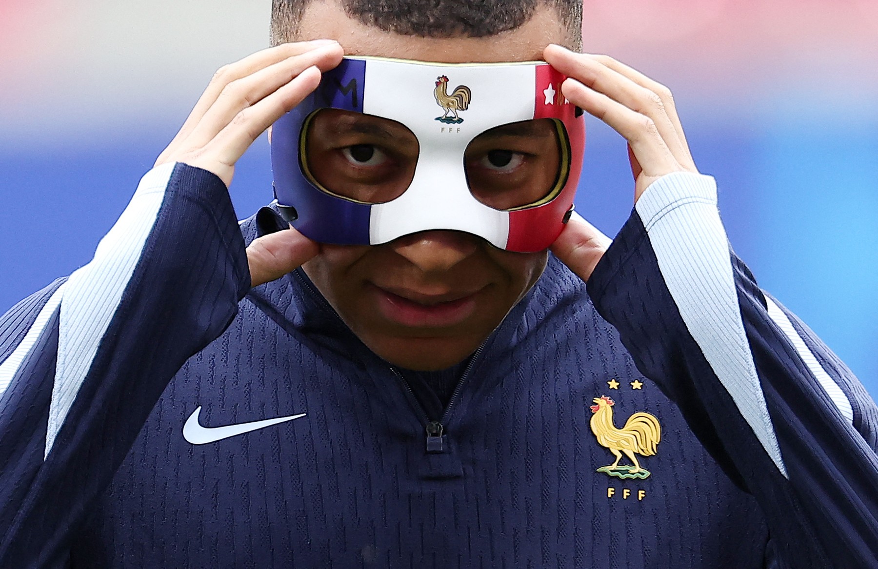 France's forward #10 Kylian Mbappe adjusts his face mask as he takes part in a MD-1 training session at the Leipzig Stadium in Leipzig on June 20, 2024, on the eve of their UEFA Euro 2024 Group D football match against Netherlands.,Image: 883354044, License: Rights-managed, Restrictions: , Model Release: no, Credit line: FRANCK FIFE / AFP / Profimedia