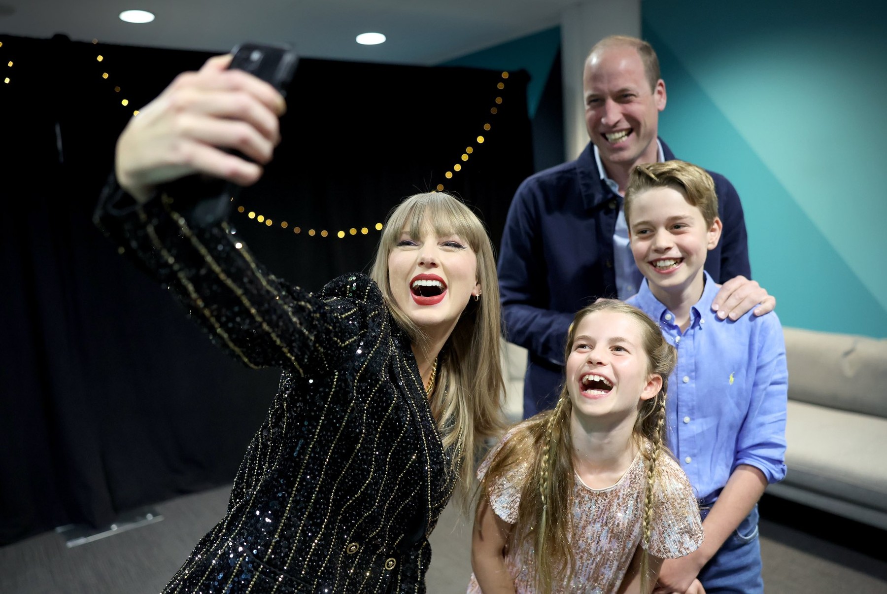 Taylor Swift takes a selfie backstage with William, George and Charlotte at her Wembley gig on Friday night June 21, 2024. The Prince of Wales has thanked Taylor Swift for a great evening after he celebrated his birthday at her Wembley gig on Friday night. Kensington Palace posted a picture on social media of Swift taking a selfie with William, Prince George and Princess Charlotte backstage before the concert.,Image: 883922055, License: Rights-managed, Restrictions: , Model Release: no, Credit line: EPN/Newscom / Newscom / Profimedia