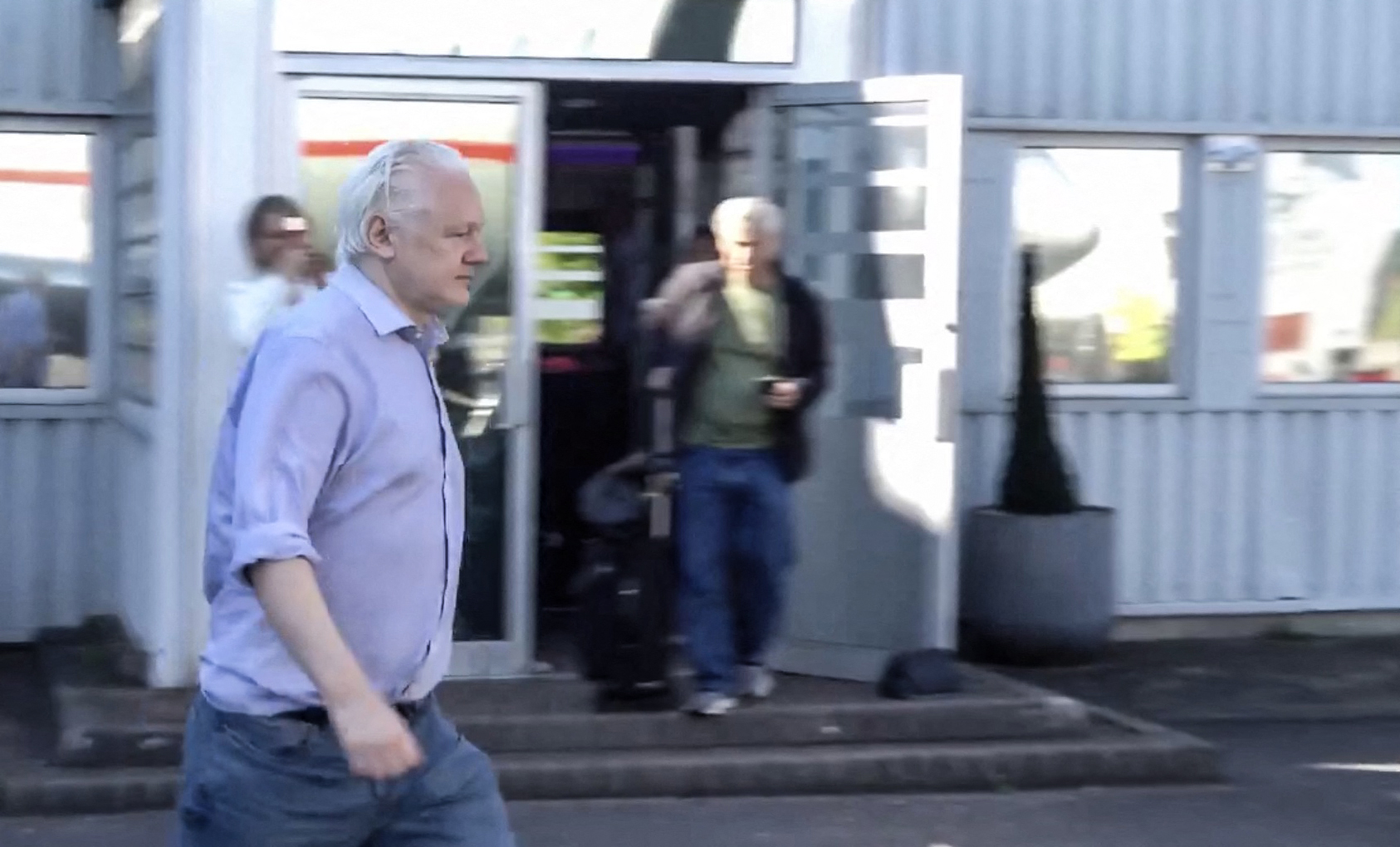 This screen shot courtesy of WikiLeaks X page shows Wikileaks founder Julian Assange walking to board a plane from London Stansted Airport on June 24, 2024. Julian Assange "is free" and has been released from a high-security London prison where he was held for five years, his Wikileaks organisation said June 24, after reaching a US plea deal.
The 52-year-old Australian was taken Monday, June 24, from Belmarsh prison to London's Stansted airport, a Wikileaks statement said, from where he boarded a flight to an unnamed destination.,Image: 884423365, License: Rights-managed, Restrictions: RESTRICTED TO EDITORIAL USE - MANDATORY CREDIT "AFP PHOTO / HANDOUT / WikiLeaks " - NO MARKETING - NO ADVERTISING CAMPAIGNS - DISTRIBUTED AS A SERVICE TO CLIENTS, ***
HANDOUT image or SOCIAL MEDIA IMAGE or FILMSTILL for EDITORIAL USE ONLY! * Please note: Fees charged by Profimedia are for the Profimedia's services only, and do not, nor are they intended to, convey to the user any ownership of Copyright or License in the material. Profimedia does not claim any ownership including but not limited to Copyright or License in the attached material. By publishing this material you (the user) expressly agree to indemnify and to hold Profimedia and its directors, shareholders and employees harmless from any loss, claims, damages, demands, expenses (including legal fees), or any causes of action or allegation against Profimedia arising out of or connected in any way with publication of the material. Profimedia does not claim any copyright or license in the attached materials. Any downloading fees charged by Profimedia are for Profimedia's services only. * Handling Fee Only 
***, Model Release: no, Credit line: AFP / AFP / Profimedia