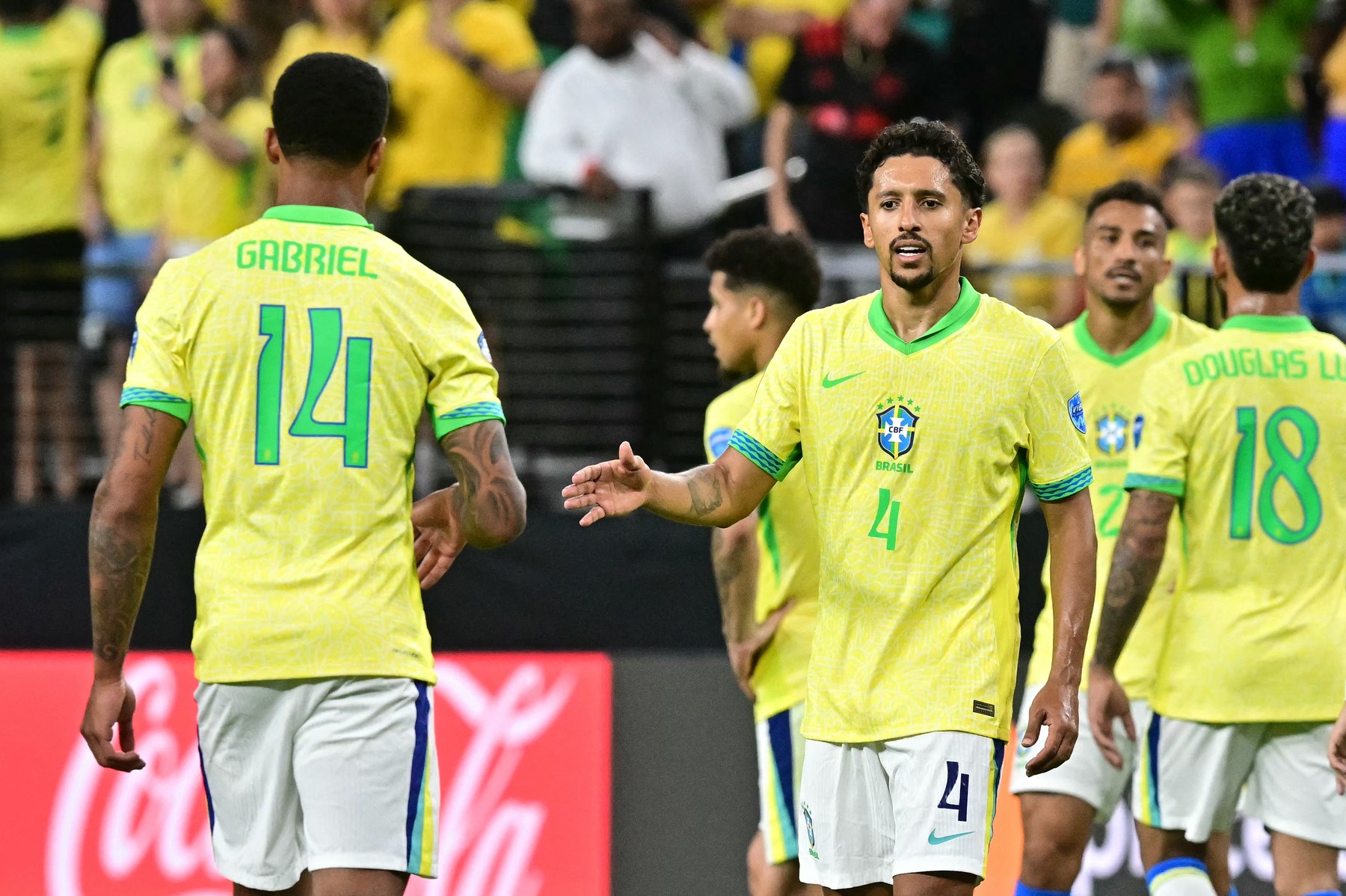 Brazil's defender #04 Marquinhos and teammates celebrate after winning the Conmebol 2024 Copa America tournament group D football match between Paraguay and Brazil at Allegiant Stadium in Las Vegas, Nevada on June 28, 2024.,Image: 885630117, License: Rights-managed, Restrictions: , Model Release: no, Credit line: Frederic J. Brown / AFP / Profimedia