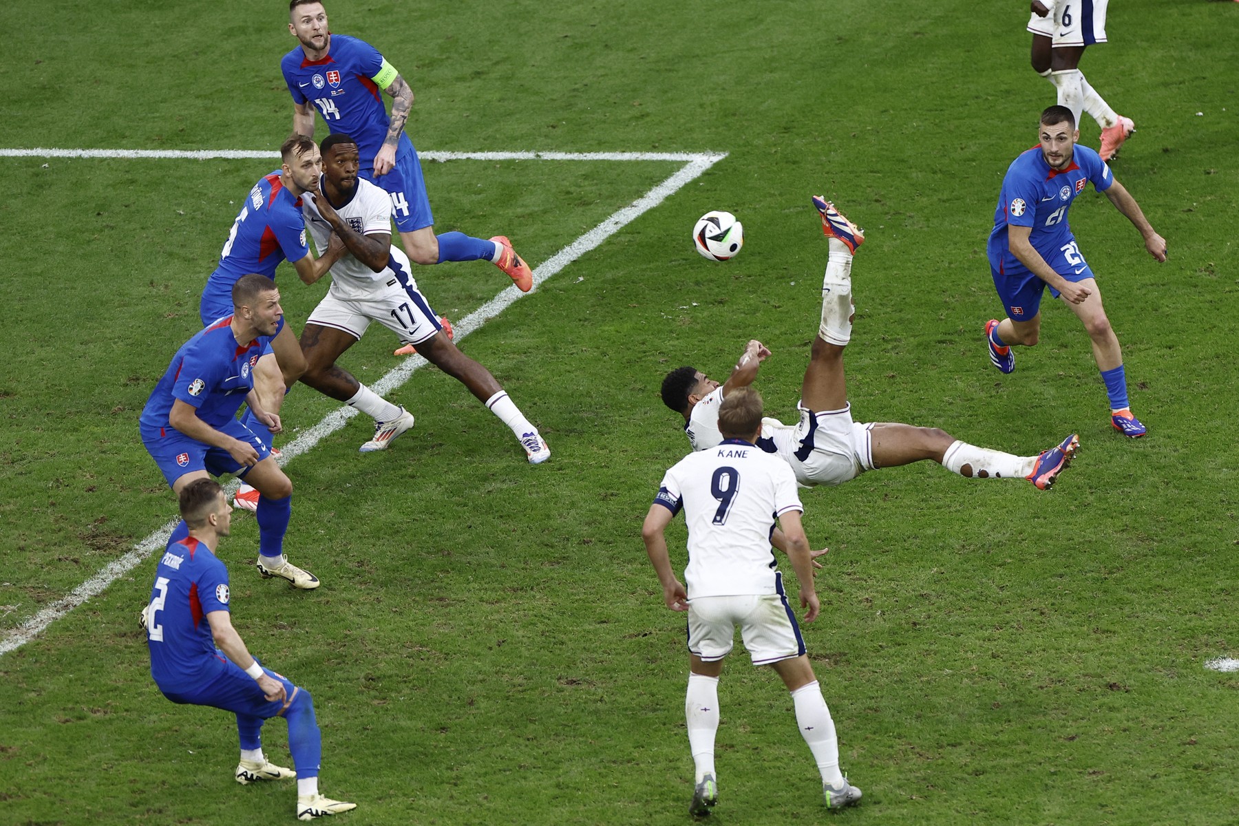 England's midfielder #10 Jude Bellingham shoots and scores his team's first goal during the UEFA Euro 2024 round of 16 football match between England and Slovakia at the Arena AufSchalke in Gelsenkirchen on June 30, 2024.,Image: 886022586, License: Rights-managed, Restrictions: , Model Release: no, Credit line: KENZO TRIBOUILLARD / AFP / Profimedia