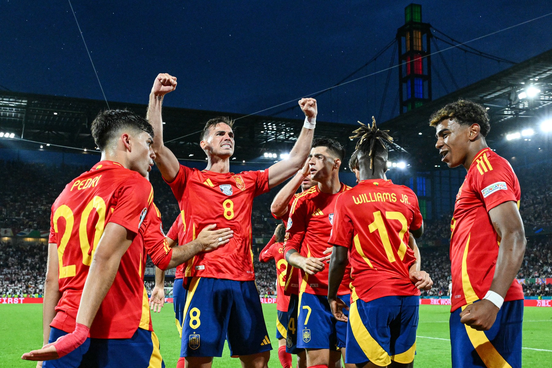 Spain's midfielder #08 Fabian Ruiz celebrates with teammates after scoring his team's second goal during the UEFA Euro 2024 round of 16 football match between Spain and Georgia at the Cologne Stadium in Cologne on June 30, 2024.,Image: 886050958, License: Rights-managed, Restrictions: , Model Release: no, Credit line: Alberto PIZZOLI / AFP / Profimedia