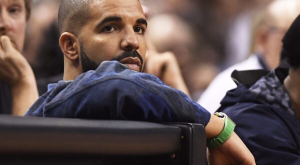 Rapper Drake watches the action between the Toronto Raptors and the Cleveland Cavaliers during the second half of Game 3 of an NBA basketball second-round playoff series in Toronto on Friday, May 5, 2017. (Frank Gunn/The Canadian Press via AP)