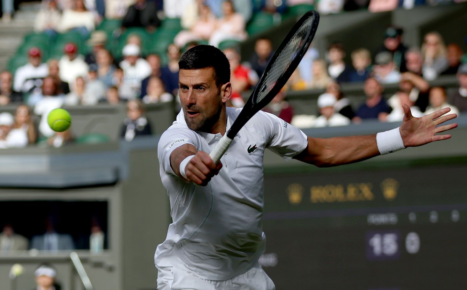 epa11463210 Novak Djokovic of Serbia in action during the Men's 3rd round match against Alexei Popyrin of Australia at the Wimbledon Championships, Wimbledon, Britain, 06 July 2024.  EPA/ADAM VAUGHAN  EDITORIAL USE ONLY