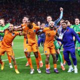 epa11463997 Netherlands players celebrate with supporters after winning the UEFA EURO 2024 quarter-finals soccer match between Netherlands and Turkey, in Berlin, Germany, 06 July 2024.  EPA/FILIP SINGER
