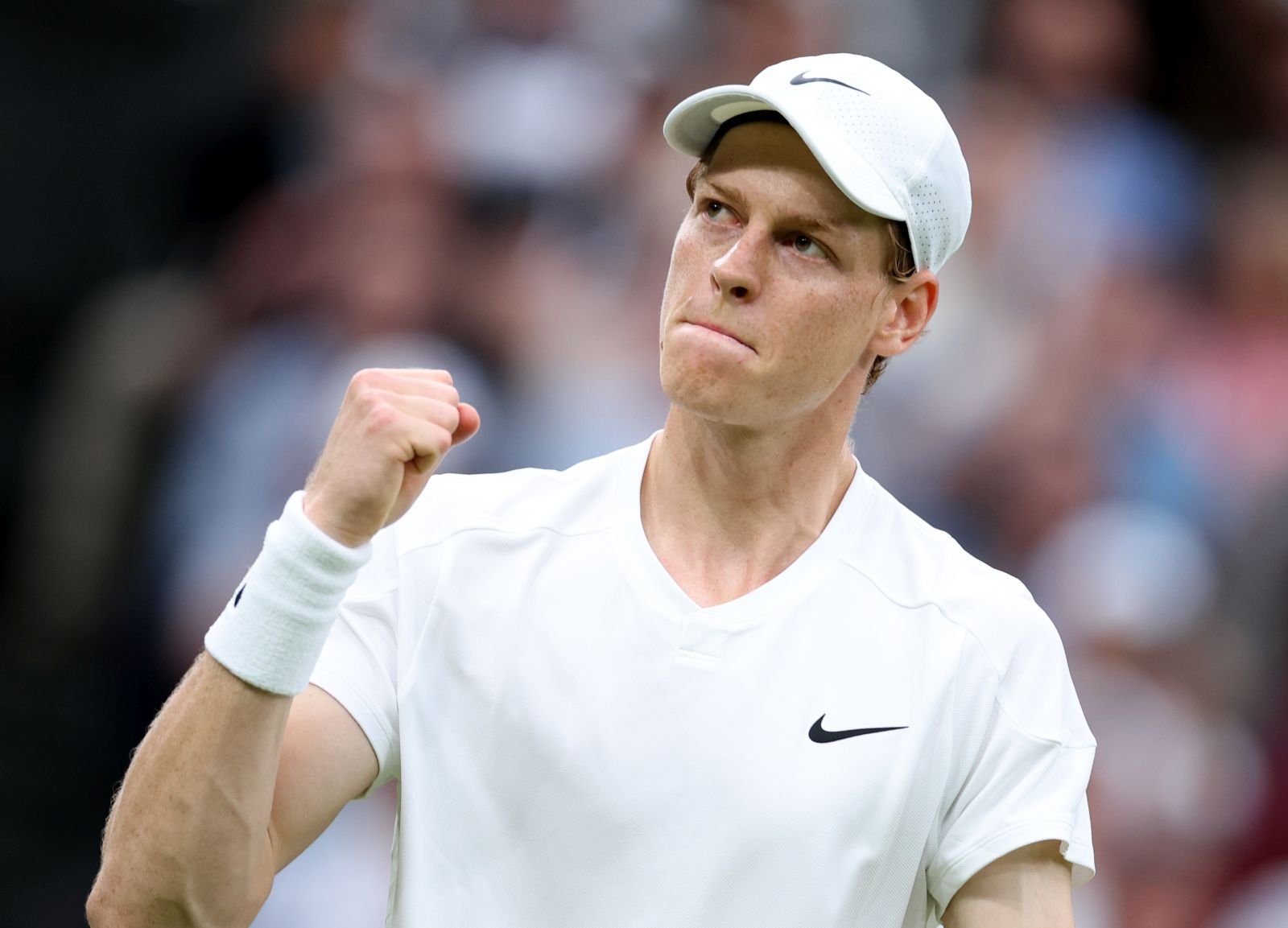 epa11455650 Jannik Sinner of Italy in action against Matteo Berrettini of Italy during the Mens Singles 2nd round match at the Wimbledon Championships, Wimbledon, Britain, 03 July 2024.  EPA/ADAM VAUGHAN  EDITORIAL USE ONLY