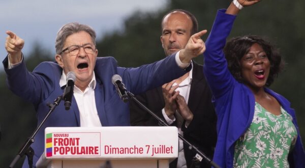 epaselect epa11465954 (L-R) Leader of La France Insoumise (LFI) Jean-Luc Melenchon, LFI President Manuel Bompard and newly re-elected LFI Deputy Daniele Obono react during a speech after the announcement of the results of the second round of the legislative elections in Paris, France, 07 July 2024. France voted in the second round of the legislative elections on 07 July. According to the first official results, the left-wing  New Popular Front (Nouveau Front populaire, NFP) was ahead of President Macron's party and Le Pen's far-right National Rally (RN).  EPA/ANDRE PAIN