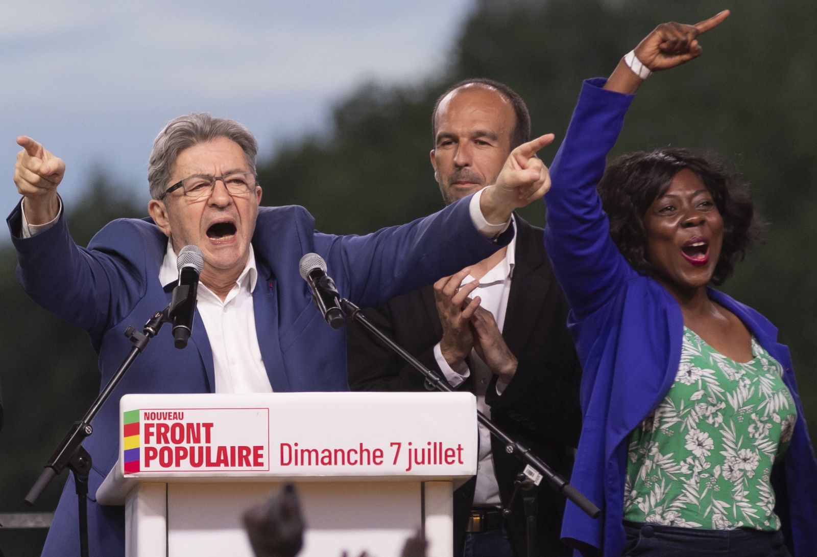 epaselect epa11465954 (L-R) Leader of La France Insoumise (LFI) Jean-Luc Melenchon, LFI President Manuel Bompard and newly re-elected LFI Deputy Daniele Obono react during a speech after the announcement of the results of the second round of the legislative elections in Paris, France, 07 July 2024. France voted in the second round of the legislative elections on 07 July. According to the first official results, the left-wing  New Popular Front (Nouveau Front populaire, NFP) was ahead of President Macron's party and Le Pen's far-right National Rally (RN).  EPA/ANDRE PAIN