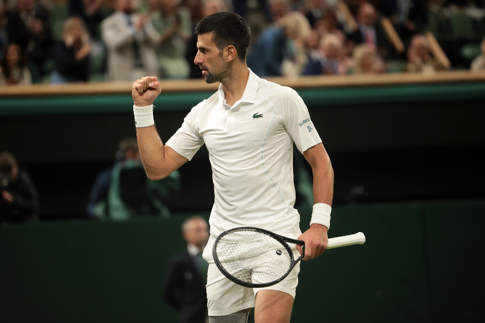 epa11467447 Novak Djokovic of Serbia celebrates after winning against Holger Rune of Denmark (unseen) during their round of 16 match at the Wimbledon Championships, Wimbledon, Britain, 08 July 2024.  EPA/TIM IRELAND  EDITORIAL USE ONLY