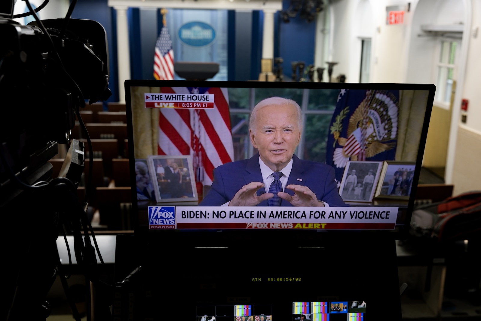 epa11479117 A monitor shows US President Joe Biden delivering a live address from the Oval Office, in the James Brady Press Briefing Room of the White House, in Washington, DC, USA, 14 July 2024. US President Biden called for nonviolence while speaking on former US President Trump being injured in an assassination attempt at a rally on the 13th of July that left a shooting suspect and one bystander dead.  EPA/MICHAEL REYNOLDS