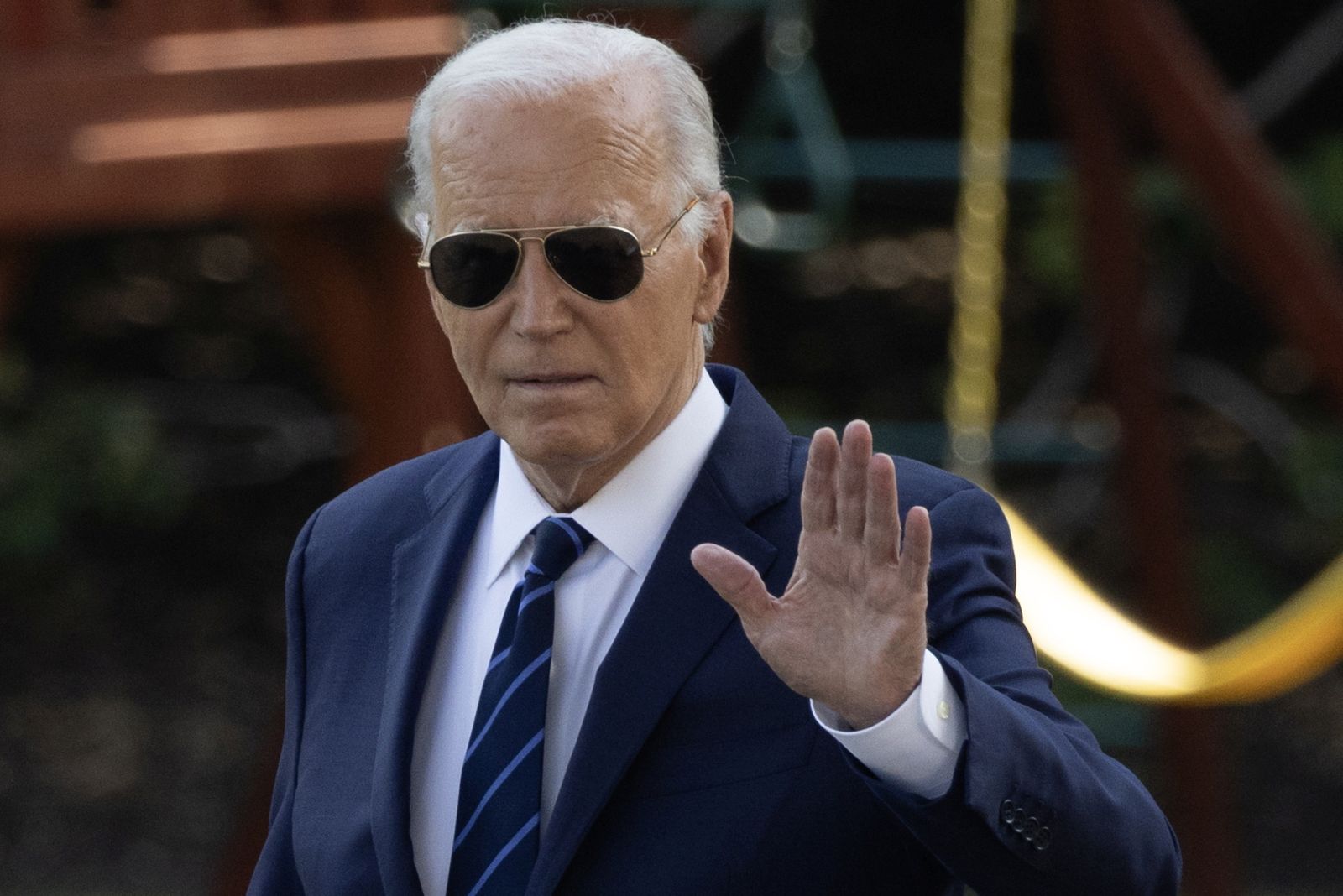 epa11480543 US President Joe Biden waves as he walks across the South Lawn to depart the White House by Marine One, in Washington, DC, USA, 15 July 2024. Biden travels to Las Vegas, Nevada.  EPA/MICHAEL REYNOLDS