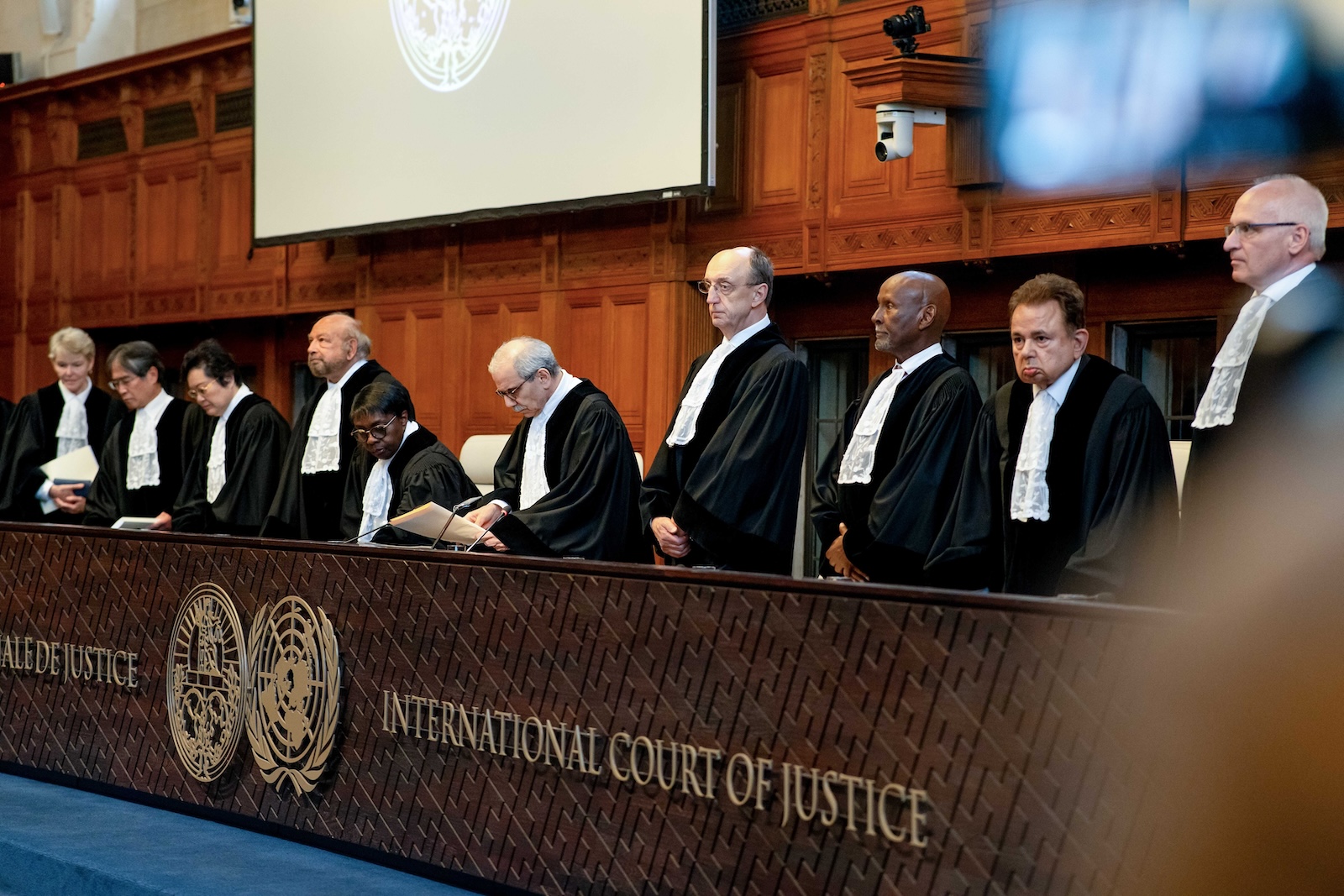 epa11487549 The panel of judges, with President Nawaf Salam (C), at the International Court of Justice in The Hague, the Netherlands, during a non-binding ruling on the legal consequences of the Israeli occupation of the West Bank and East Jerusalem, 19 July 2024. The ICJ advises that Israel's settlement policy is in violation of international law.  EPA/LINA SELG