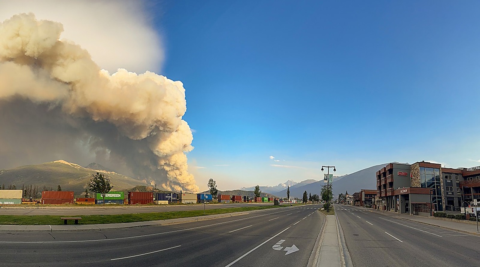 July 25, 2024, Jasper, Alberta, Canada: Smoke from a wildfire rises over Jasper National Park in Alberta. Huge, fast-moving wildfires have destroyed up to half of the historic Canadian town of Jasper, officials say, and the blazes are still out of control as firefighters try to save as many buildings as possible. Entire streets of the main town in western Canada's Jasper National Park have been levelled by the fire. No deaths have been reported, some 20,000 tourists and 5,000 residents have fled the mountainous area in Alberta.,Image: 892405838, License: Rights-managed, Restrictions: , Model Release: no, Credit line: Jasper National Park / Zuma Press / Profimedia