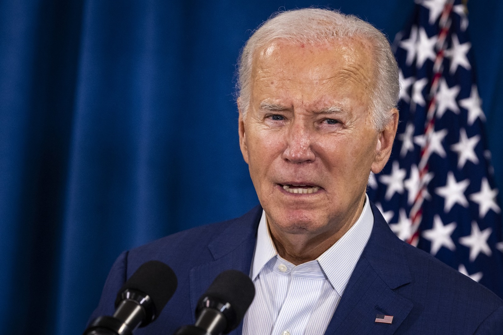 US President Joe Biden speaks after his Republican opponent Donald Trump was injured following a shooting at an election rally in Pennsylvania, at the Rehoboth Beach Police Department, in Rehoboth Beach, Delaware, July 13, 2024. US President Joe Biden led the condemnation after his election rival Donald Trump was wounded in a shooting incident at a rally in Pennsylvania July 13 that also reportedly killed at least one bystander. 
Political leaders on both sides of the aisle slammed the violence minutes after the Republican candidate was rushed off stage by the Secret Service, blood running down his face.,Image: 889584710, License: Rights-managed, Restrictions: , Model Release: no, Credit line: SAMUEL CORUM / AFP / Profimedia