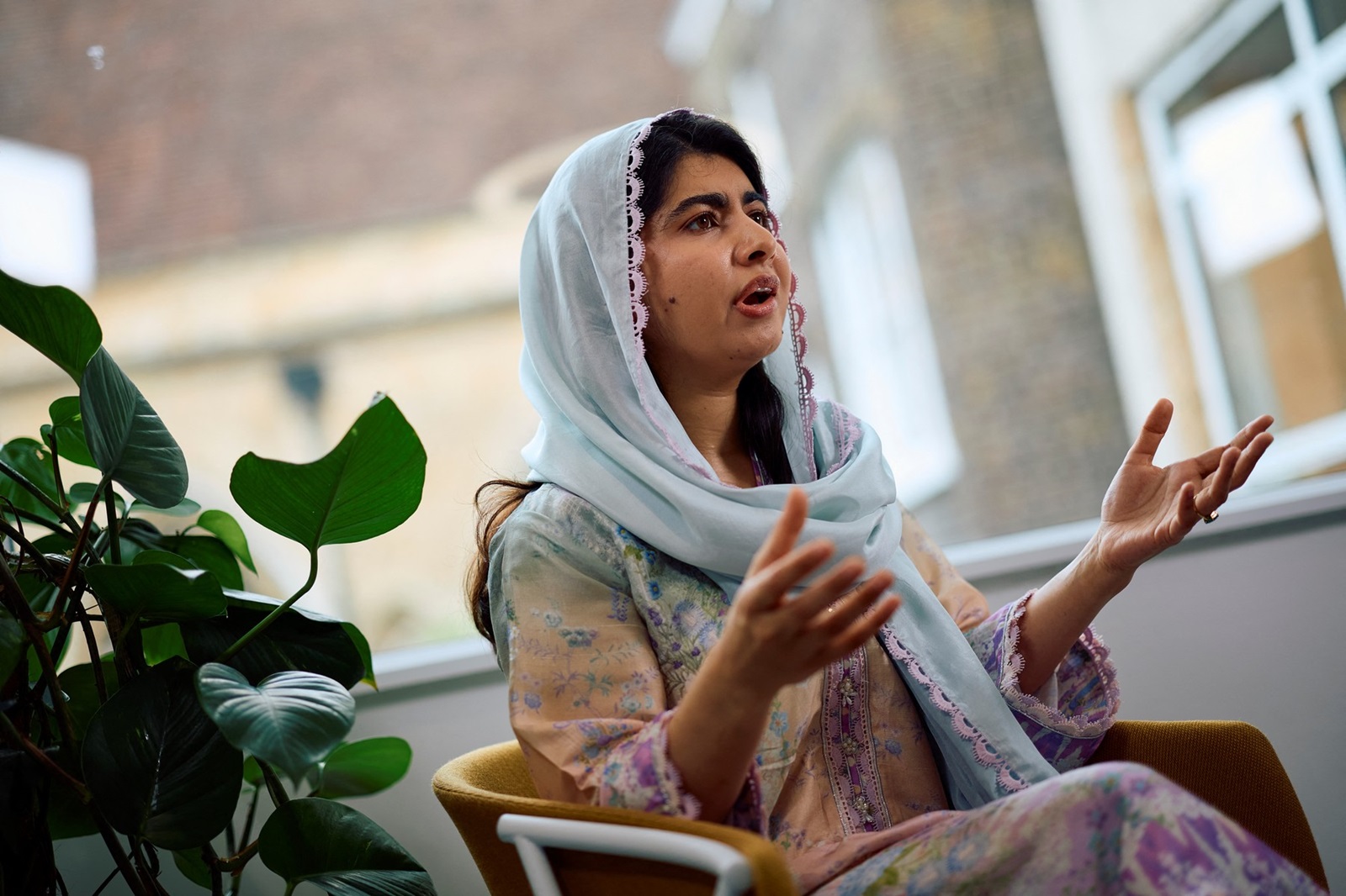 Pakistani Nobel Peace Prize laureate Malala Yousafzai speaks during an interview with AFP in London on July 12, 2024. Malala called for Pakistan to "reverse" its policy of deporting undocumented Afghans in an interview with AFP.,Image: 889360697, License: Rights-managed, Restrictions: TO GO WITH AFP STORY BY AKSHATA KAPOOR, Model Release: no, Credit line: BENJAMIN CREMEL / AFP / Profimedia