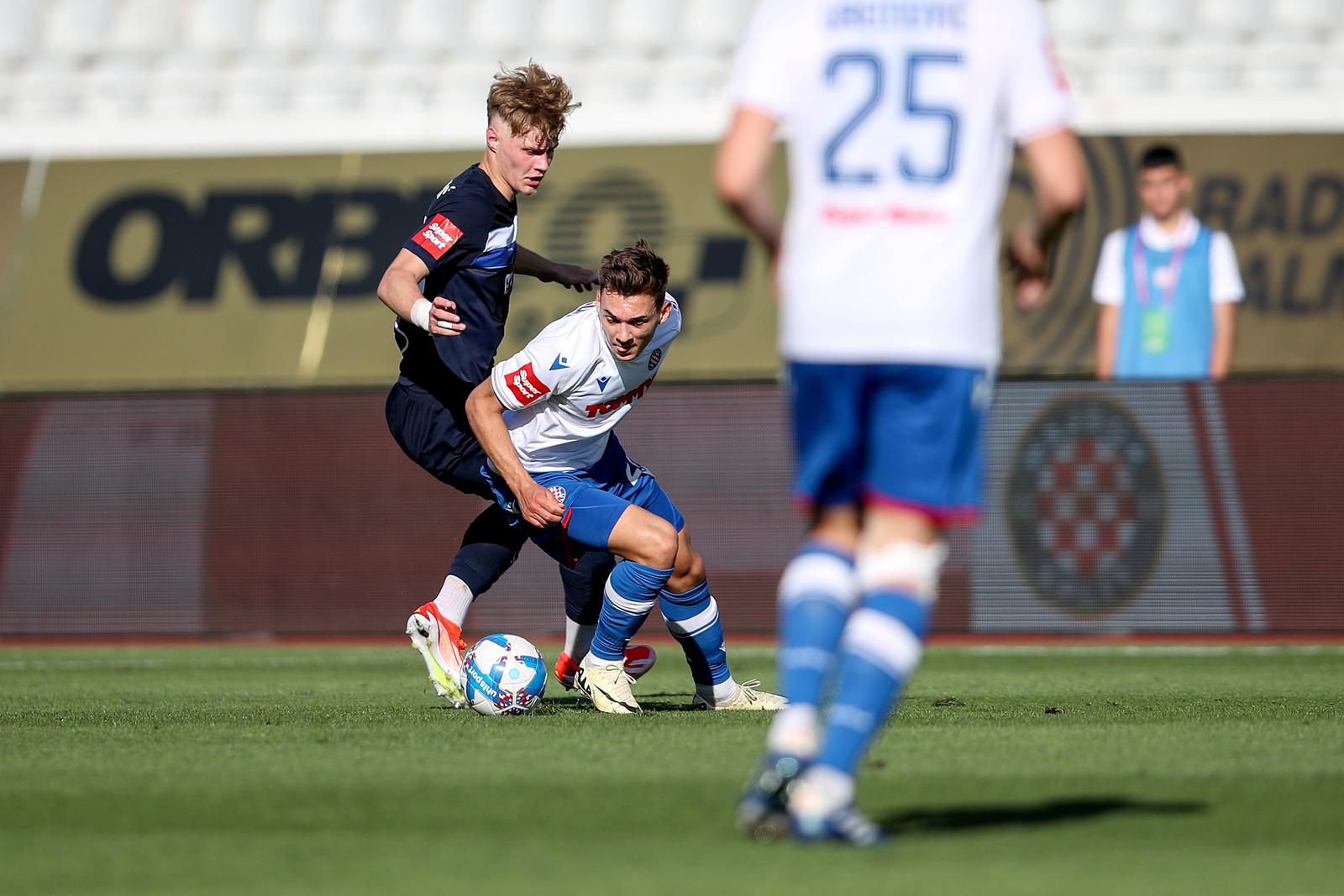 14.04.2024., stadion Poljud, Split - SuperSport HNL, 30. kolo, HNK Hajduk - NK Osijek. Anton Matkovic, Niko Sigur Photo: Sime Zelic/PIXSELL