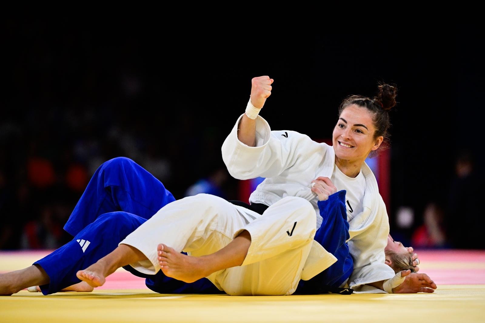 Croatian judoka Barbara Matic, Italian judoka Kim Polling pictured in action during and Croatian judoka Barbara Matic celebrates during a judo bout between Croatian Matic and Italian Polling in the elimination round of 32 of the -70kg category of the women's judo competition at the Paris 2024 Olympic Games, on Wednesday 31 July 2024 in Paris, France. The Games of the XXXIII Olympiad are taking place in Paris from 26 July to 11 August. The Belgian delegation counts 165 athletes competing in 21 sports. BELGA PHOTO DIRK WAEM Photo: DIRK WAEM/PIXSELL