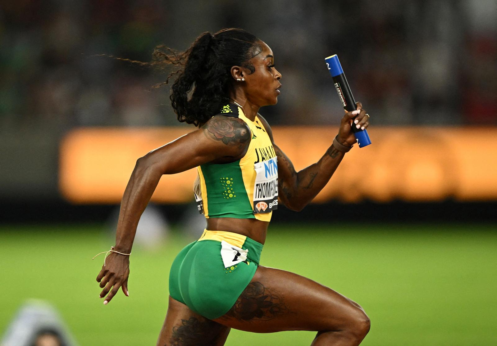 FILE PHOTO: Athletics - World Athletics Championship - Women's 4x100m Relay Heats - National Athletics Centre, Budapest, Hungary - August 25, 2023 Jamaica's Elaine Thompson-Herah  in action during heat 1 REUTERS/Dylan Martinez/File Photo Photo: Dylan Martinez/REUTERS