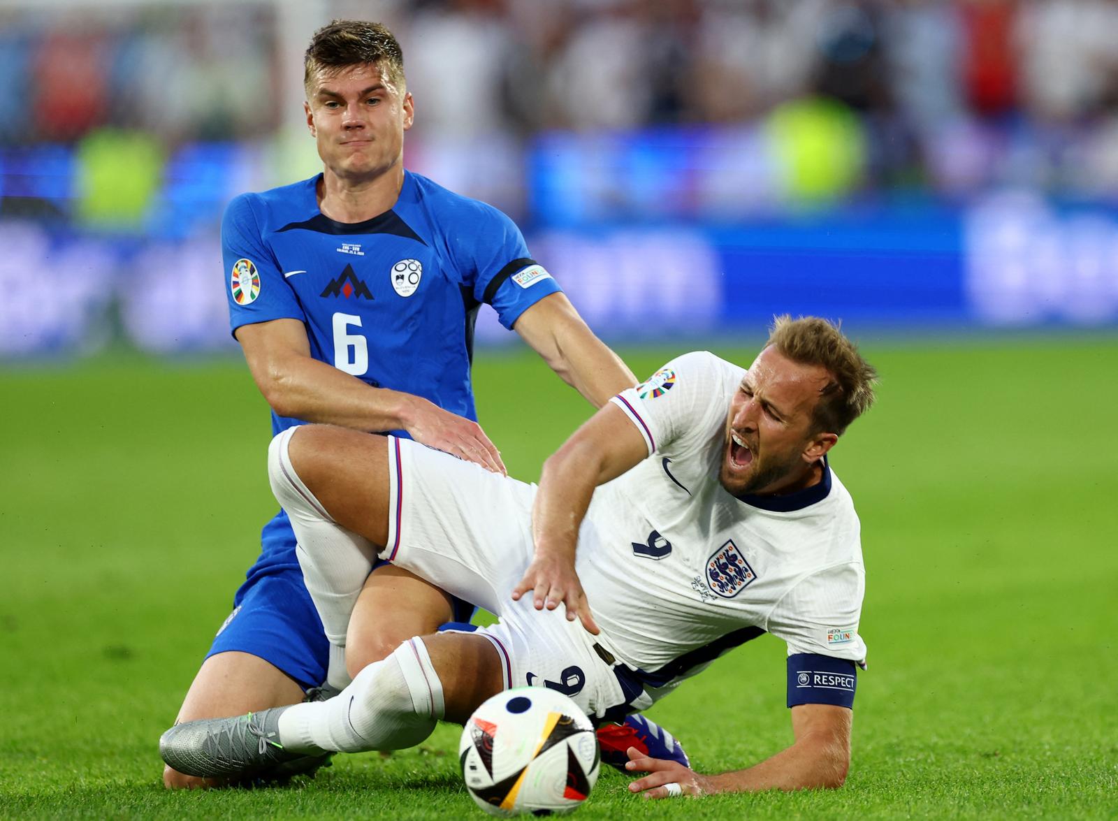 Soccer Football - Euro 2024 - Group C - England v Slovenia - Cologne Stadium, Cologne, Germany - June 25, 2024  England's Harry Kane reacts as Slovenia's Jaka Bijol looks on REUTERS/Lee Smith Photo: Lee Smith/REUTERS