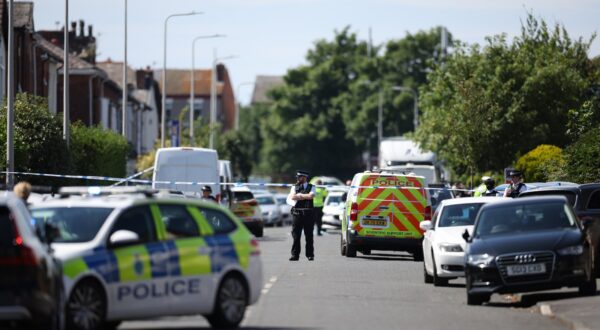 epa11505918 Police at the scene of suspected multiple stabbings in Hart Street in Southport, Britain 29 July 2024. Armed police detained a male and seized a knife after a number of people were injured in a reported stabbing according to Merseyside Police. Eight patients with stab injuries have been treated at the scene so far and have been taken to hospitals, North West Ambulance Service said.  EPA/ADAM VAUGHAN