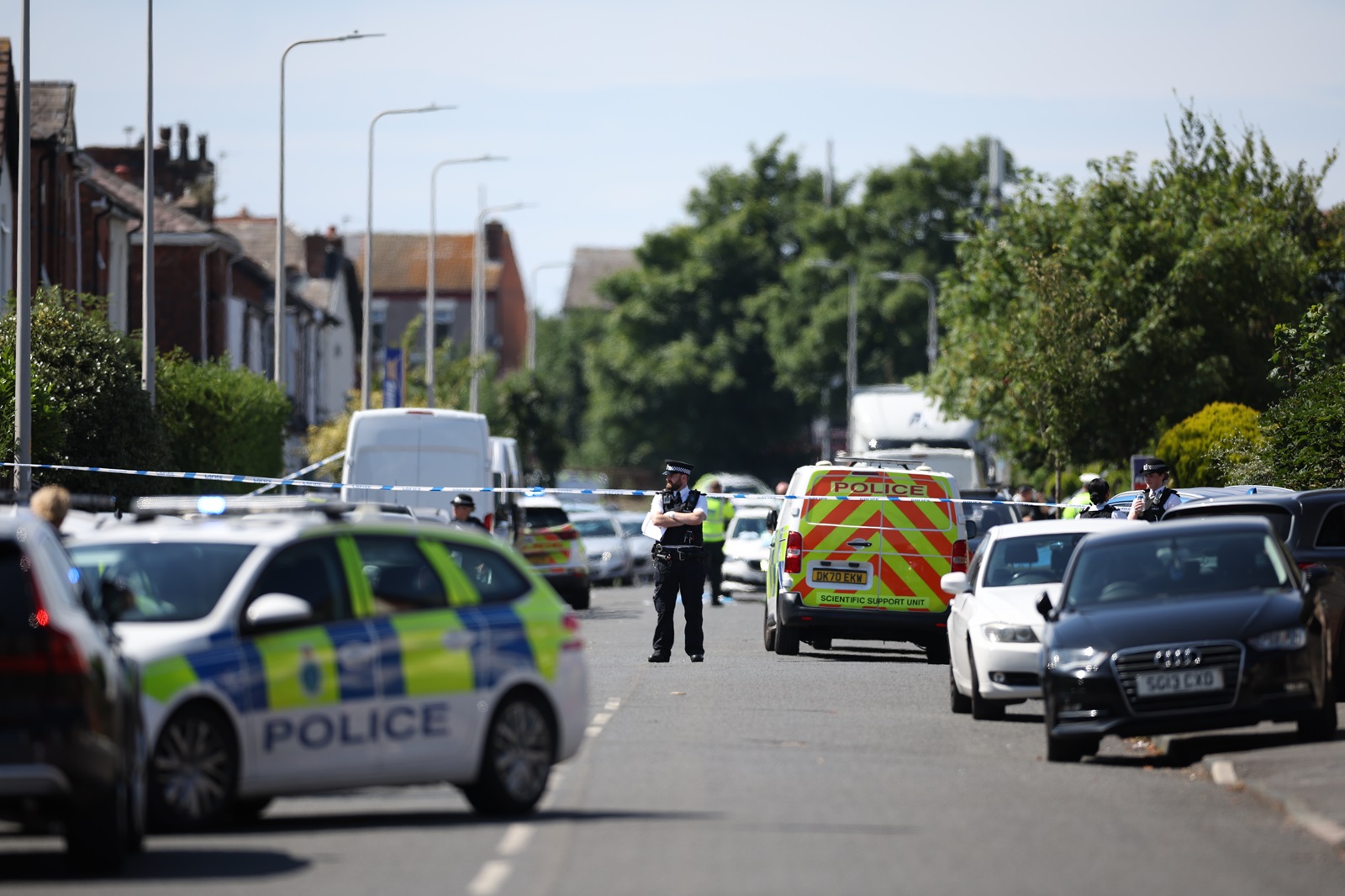 epa11505918 Police at the scene of suspected multiple stabbings in Hart Street in Southport, Britain 29 July 2024. Armed police detained a male and seized a knife after a number of people were injured in a reported stabbing according to Merseyside Police. Eight patients with stab injuries have been treated at the scene so far and have been taken to hospitals, North West Ambulance Service said.  EPA/ADAM VAUGHAN