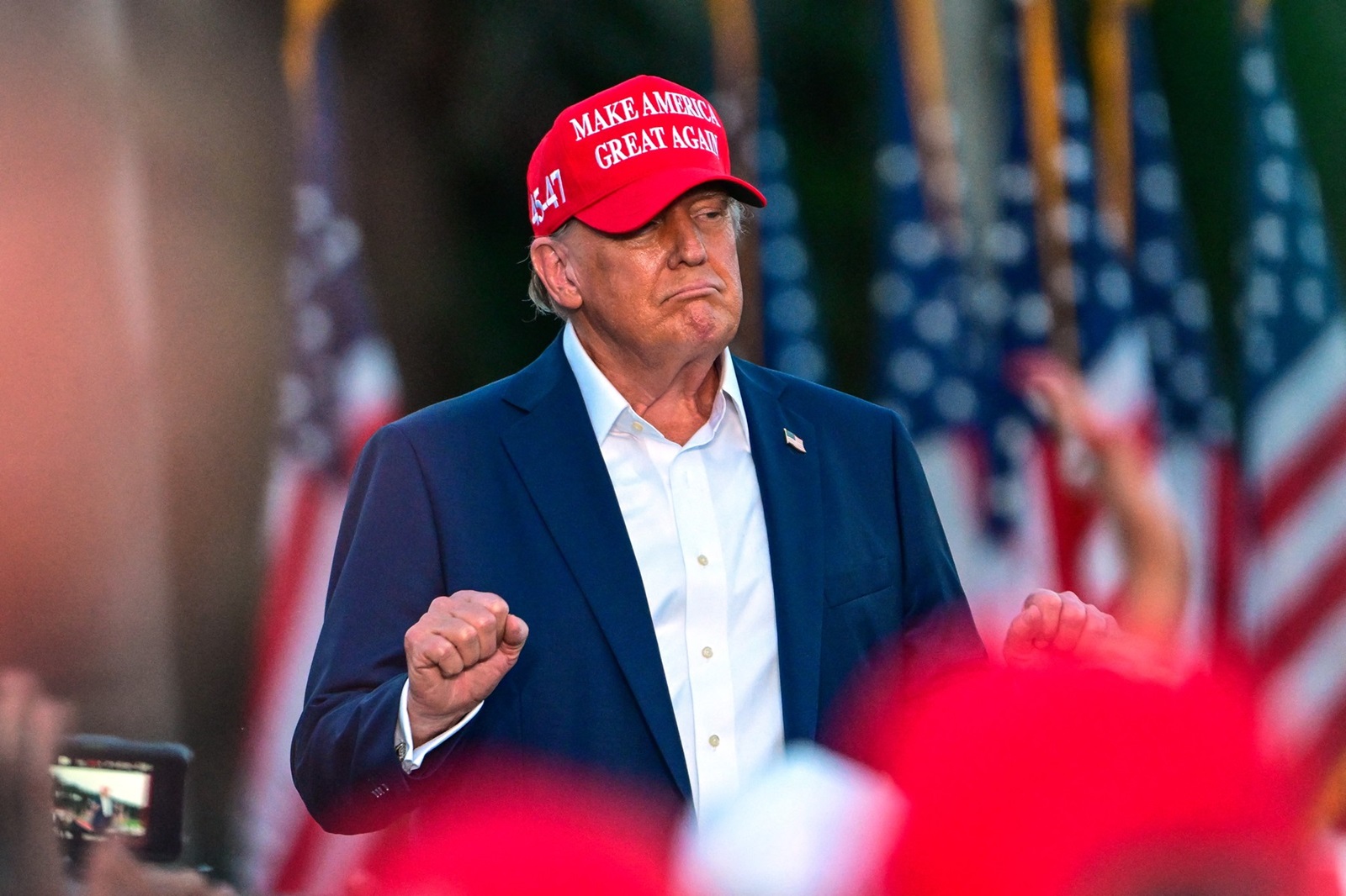 Former US President and Republican presidential candidate Donald Trump gestures during a rally in Doral, Florida, on July 9, 2024.,Image: 888663665, License: Rights-managed, Restrictions: , Model Release: no, Credit line: Giorgio Viera / AFP / Profimedia