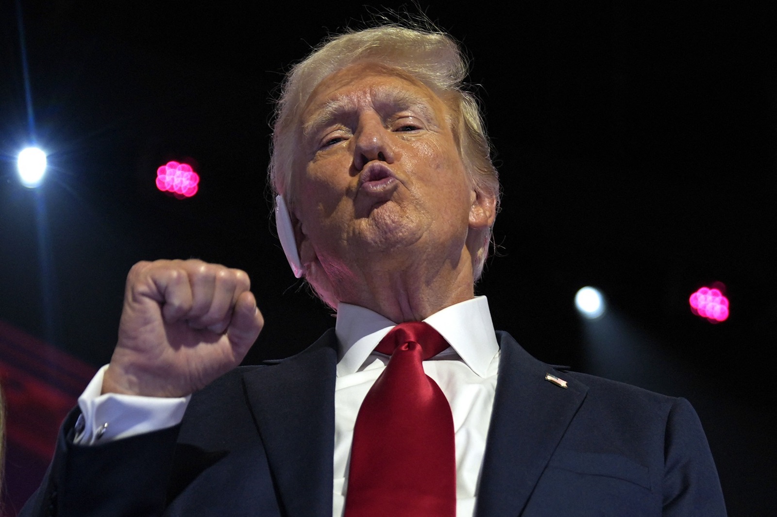 Former US President and 2024 Republican presidential candidate Donald Trump gestures after accepting his party's nomination at the end of the last day of the 2024 Republican National Convention at the Fiserv Forum in Milwaukee, Wisconsin, on July 18, 2024. Days after he survived an assassination attempt Trump won formal nomination as the Republican presidential candidate and picked Ohio US Senator J.D. Vance for running mate.,Image: 890750804, License: Rights-managed, Restrictions: , Model Release: no, Credit line: Nick Oxford / AFP / Profimedia