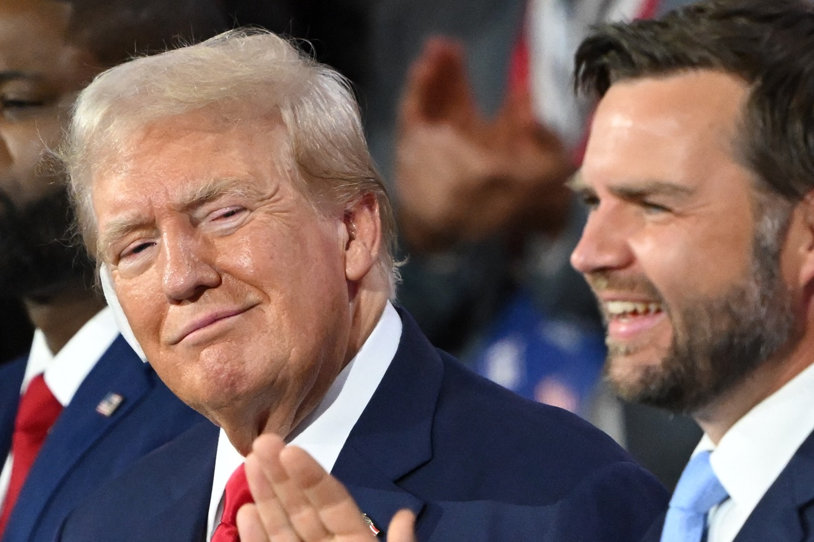 Former US President and 2024 Republican presidential candidate Donald Trump sits next to US Senator from Ohio and 2024 Republican vice presidential candidate J. D. Vance (R) during the first day of the 2024 Republican National Convention at the Fiserv Forum in Milwaukee, Wisconsin, July 15, 2024. Donald Trump won formal nomination as the Republican presidential candidate and picked a right-wing loyalist for running mate, kicking off a triumphalist party convention in the wake of last weekend's failed assassination attempt.,Image: 889940760, License: Rights-managed, Restrictions: , Model Release: no, Credit line: ANDREW CABALLERO-REYNOLDS / AFP / Profimedia