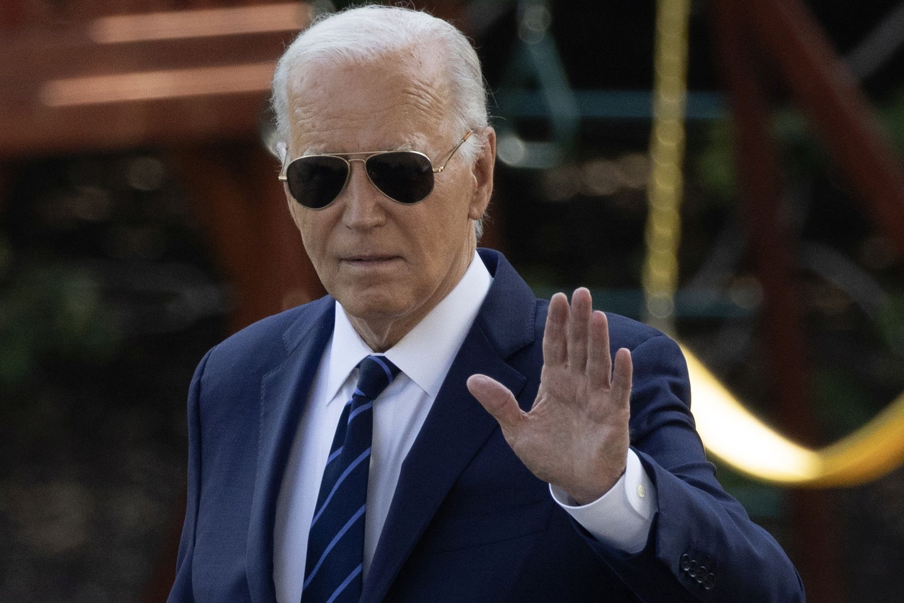 epa11480543 US President Joe Biden waves as he walks across the South Lawn to depart the White House by Marine One, in Washington, DC, USA, 15 July 2024. Biden travels to Las Vegas, Nevada.  EPA/MICHAEL REYNOLDS