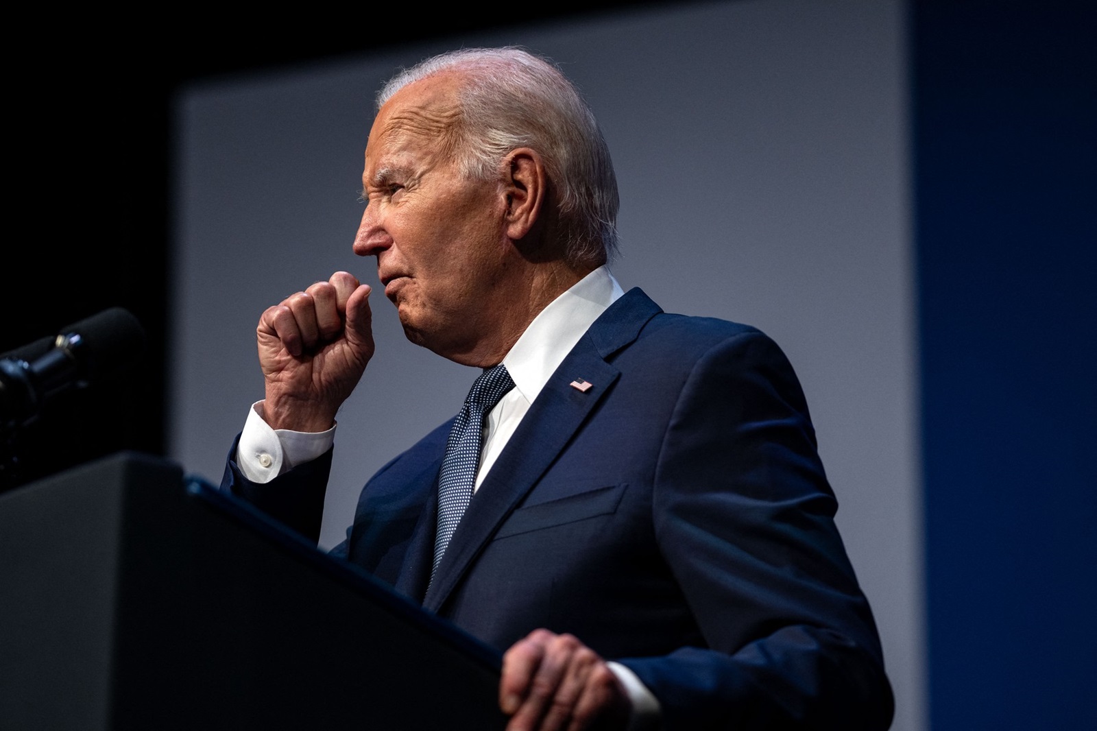 This photo taken on July 16, 2024 shows US President Joe Biden clearing his throat as he speaks on economics during the Vote To Live Properity Summit at the College of Southern Nevada in Las Vegas, Nevada. US President Joe Biden tested positive for Covid with mild symptoms on July 17, shortly after conceding he would consider dropping his reelection bid if doctors diagnosed him with a serious medical condition.,Image: 890475778, License: Rights-managed, Restrictions: , Model Release: no, Credit line: Kent Nishimura / AFP / Profimedia