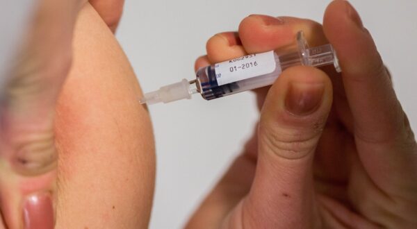 A man is given a given a measles vaccination in Berlin on February 23, 2015. A toddler has died of measles in the German capital, health authorities said, amid the country's worst outbreak in years and an intense debate about steps to boost vaccinations. The resurgence of the preventable disease in Germany, as well as in parts of the United States, coincides with a movement among some parents to refuse to vaccinate their children.,Image: 219812141, License: Rights-managed, Restrictions: GERMANY OUT, Model Release: no, Credit line: Lukas Schulze / AFP / Profimedia