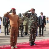 Niger's General Abdourahamane Tiani (R) salutes next to his Burkinabe counterpart Captain Ibrahim Traore (L) upon his arrival in Niamey on July 5, 2024. A divided West Africa  hosts two presidential summits this weekend -- one in Niger between Sahel region military regime leaders, followed by another in Nigeria on Sunday with leaders of a wider economic bloc. Saturday's summit in Niger's capital Niamey, will mark the first between the military leaders of a new regional bloc, the Alliance of Sahel States (AES). Mali, Burkina Faso and Niger set up the mutual defence pact in September, leaving the wider Economic Community of West African States (ECOWAS) bloc in January.,Image: 887665992, License: Rights-managed, Restrictions: , Model Release: no, Credit line: AFP / AFP / Profimedia