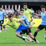 July 06, 2024: Uruguay midfielder Manuel Ugarte (5) and Brazil defender Guilherme Arana (16) challenge each other for the ball during the CONMEBOL Copa America Quarterfinals match at Allegiant Stadium between Uruguay and Brazil on July 06, 2024 in Las Vegas, NV. Christopher Trim/CSM.,Image: 887919597, License: Rights-managed, Restrictions: , Model Release: no, Credit line: Christopher Trim / Zuma Press / Profimedia