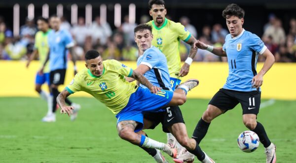 July 06, 2024: Uruguay midfielder Manuel Ugarte (5) and Brazil defender Guilherme Arana (16) challenge each other for the ball during the CONMEBOL Copa America Quarterfinals match at Allegiant Stadium between Uruguay and Brazil on July 06, 2024 in Las Vegas, NV. Christopher Trim/CSM.,Image: 887919597, License: Rights-managed, Restrictions: , Model Release: no, Credit line: Christopher Trim / Zuma Press / Profimedia