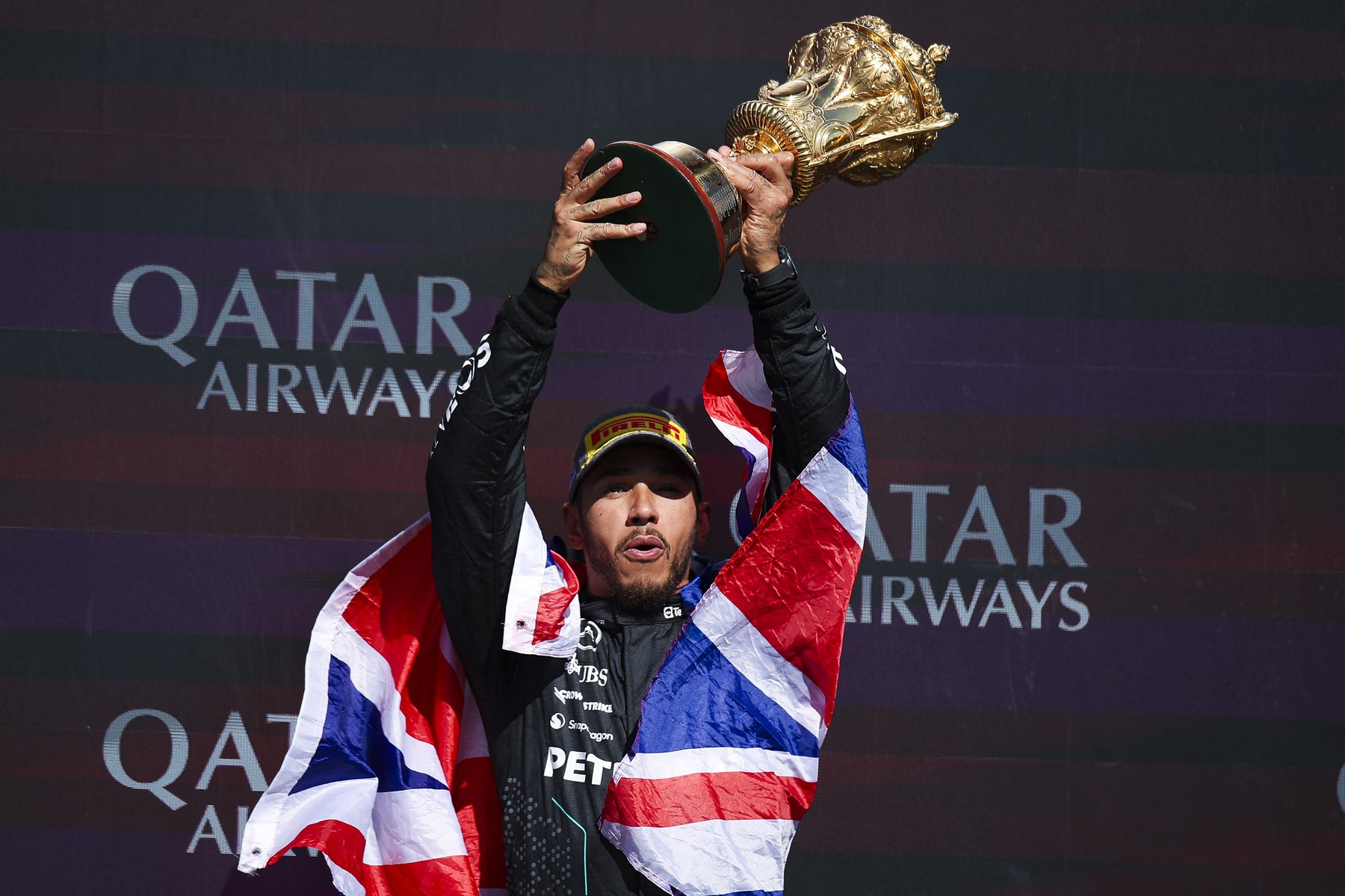 HAMILTON Lewis (gbr), Mercedes AMG F1 Team W15, portrait podium celebration during the Formula 1 Qatar Airways British Grand Prix 2024, 12th round of the 2024 Formula One World Championship from July 5 to 7, 2024 on the Silverstone Circuit, in Silverstone, United Kingdom - Photo Eric Alonso / DPPI,Image: 888012668, License: Rights-managed, Restrictions: Hungary Out, Model Release: no, Credit line: Eric Alonso / AFP / Profimedia