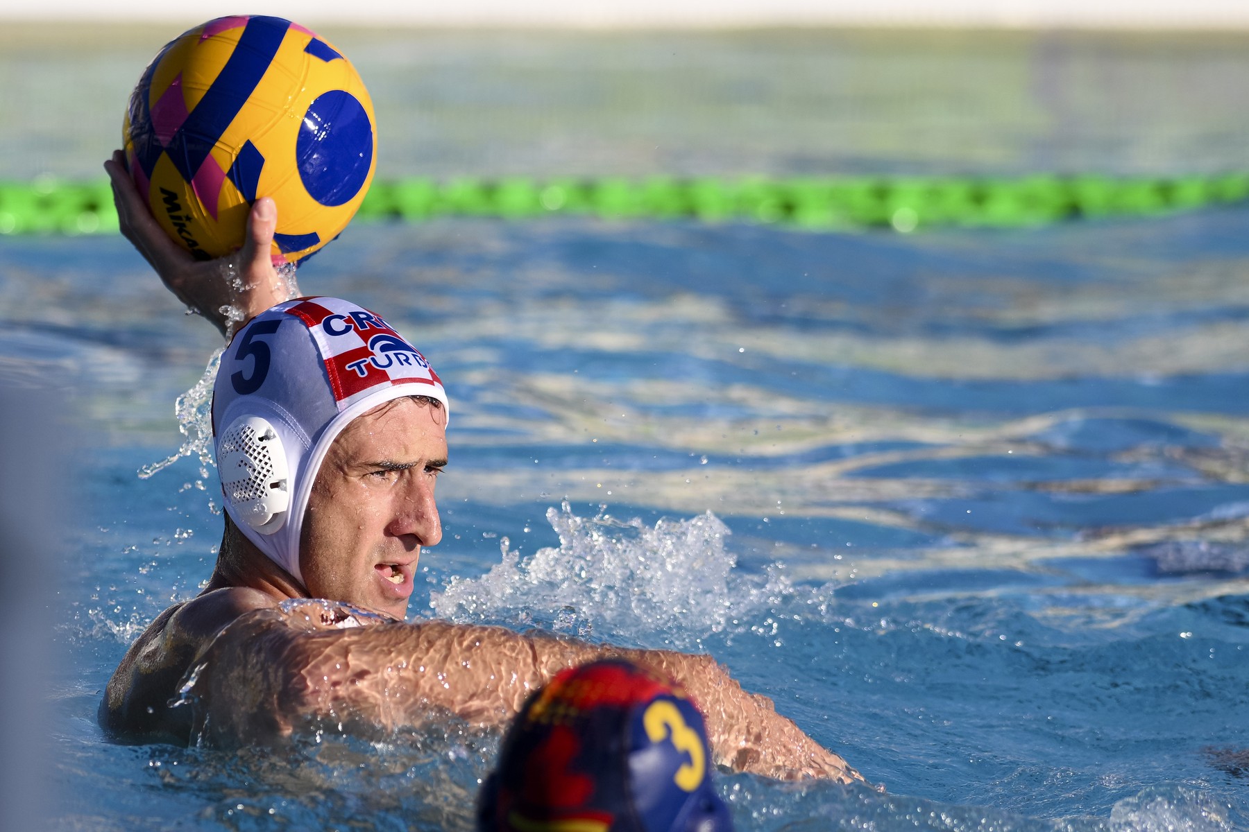 Maro Jokovic of Croatia in action during the Sardinia Cup water polo men match between Croatia (white caps) and Spain (blue caps) at piscina comunale in Alghero (Italy), July 6, 2024. Spain won 12-11 over Croatia./Sipa USA *** No Sales in France and Italy ***,Image: 888216219, License: Rights-managed, Restrictions: *** World Rights Except France and Italy *** FRAOUT ITAOUT, Model Release: no, Credit line: Insidefoto / ddp USA / Profimedia