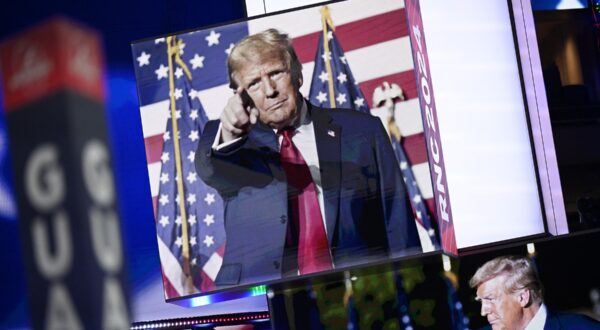 MILWAUKEE, WISCONSIN - JULY 14: Images of Donald Trump appear on stage screens in the Fiserv Forum on the day before the Republican National Convention (RNC) on July 14, 2024, in Milwaukee, Wisconsin. The RNC will be held in Milwaukee from July 15-18.   Leon Neal,Image: 889667042, License: Rights-managed, Restrictions: , Model Release: no, Credit line: LEON NEAL / Getty images / Profimedia