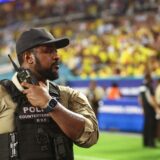 MIAMI GARDENS, FLORIDA - JULY 14: Police stands guard at the pitch prior to the CONMEBOL Copa America 2024 Final match between Argentina and Colombia at Hard Rock Stadium on July 14, 2024 in Miami Gardens, Florida.   Maddie Meyer,Image: 889759769, License: Rights-managed, Restrictions: , Model Release: no, Credit line: Maddie Meyer / Getty images / Profimedia