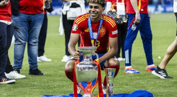 Berlin, Olympiastadion, 14.07.2024: Lamine Yamal of spain wins the young player of the tournament award and celebrates with both trophys after the final match at the UEFA EURO, EM, Europameisterschaft,Fussball 2024 Spain vs. England *** Berlin, Olympiastadion, 14 07 2024 Lamine Yamal of spain wins the young player of the tournament award and celebrates with both trophies after the final match at the Uefa Euro 2024 Spain vs England,Image: 889801498, License: Rights-managed, Restrictions: Credit images as "Profimedia/ IMAGO", Model Release: no, Credit line: Mika Volkmann / imago sportfotodienst / Profimedia