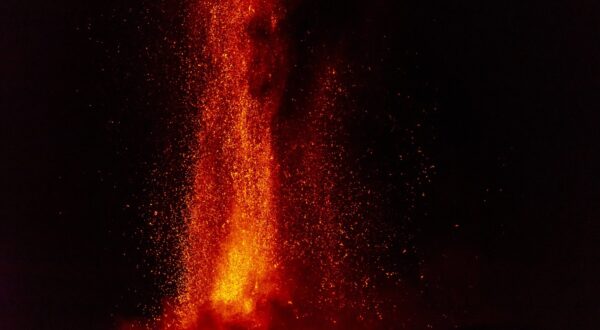 CATANIA, ITALY - JULY 16: A view of Mount Etna seen from Adrano, Catania producing a new eruption on July 16, 2024. From the late afternoon of 15 July until 03:00 on the night of 16 July, the activity was characterised by a lava fountain from the Voragine Crater that produced an eruptive column about 6000 m above sea level that propagated in an easterly direction with ash fallout in the towns of Viagrande and Acicastello until it was exhausted, a northwestern lava flow from the Bocca Nuova crater with the front at an altitude of about 3000 m above sea level. Salvatore Allegra / Anadolu/ABACAPRESS.COM