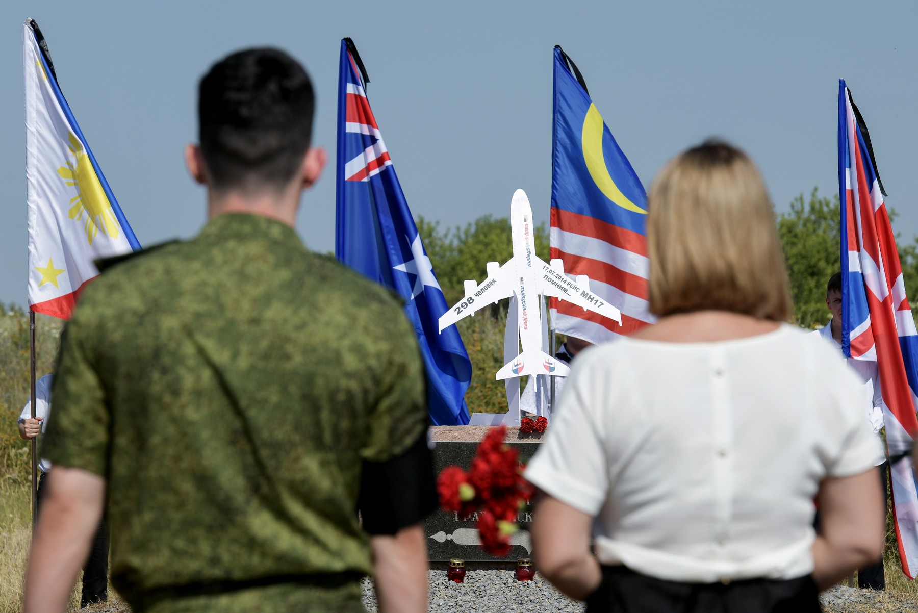 8730417 17.07.2024 People take part in a ceremony marking the 10th anniversary of the Malaysia Airlines Flight MH17 plane crash at a memorial to victims of the accident, near the village of Grabovo, Donetsk People's Republic, Russia.,Image: 890314564, License: Rights-managed, Restrictions: Editors' note: THIS IMAGE IS PROVIDED BY RUSSIAN STATE-OWNED AGENCY SPUTNIK., Model Release: no, Credit line: Taisija Voroncova / Sputnik / Profimedia