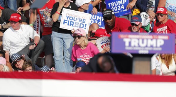 epa11476761 Supporters look on as former US President Donald Trump is rushed off stage by secret service after an incident during a campaign rally at the Butler Farm Show Inc. in Butler, Pennsylvania, USA, 13 July 2024. According to a statement by a  secret service spokesperson 'the former President is safe' and further information on the incident will be released when available.  EPA/DAVID MAXWELL