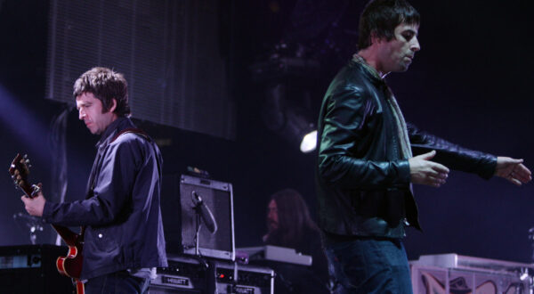 ** FILE ** In this Aug. 27, 2008 file photo, Noel, left, and Liam Gallagher of Oasis perform during the start of their Canadian tour in Vancouver, B.C. (AP Photo/The Canadian Press, Darryl Dyck, file)