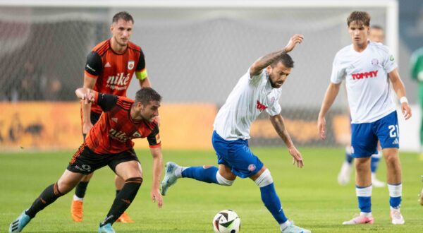 Trajkovski in the battle for the ball with Samuel Lavrincik during UEFA Conference league Quali match, MFK Ruzomberok - HNK Hajduk Split